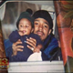 Rick Warrick holding child
WJZ